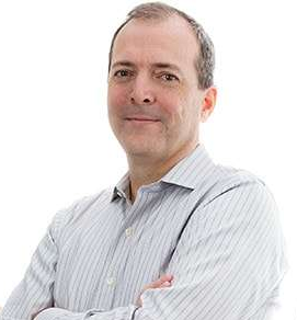 Dan, founder of dcdigit: arms folded, smiling because the site launch was flawless.